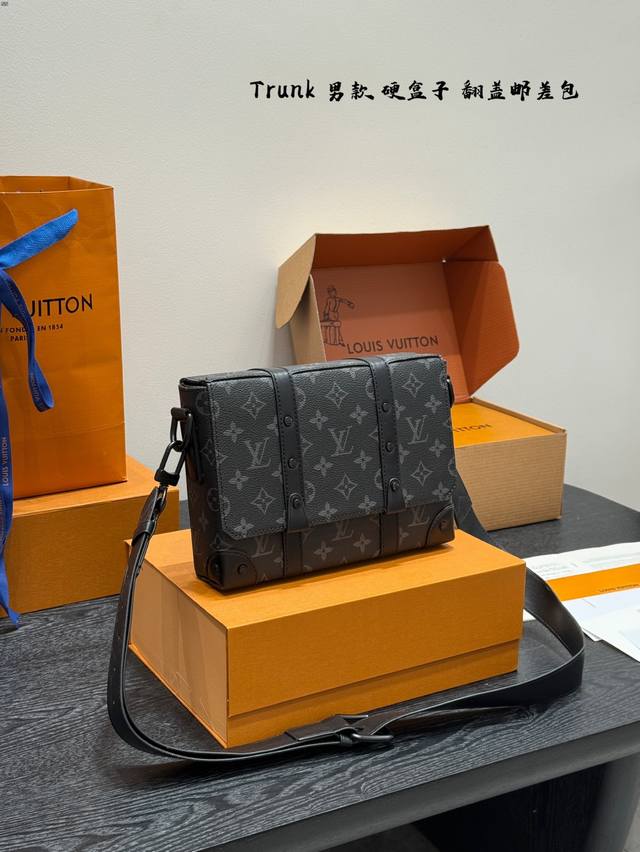 recommends the LV Trunk Men's Messenger Bag. It features a magnetic flap, hard c