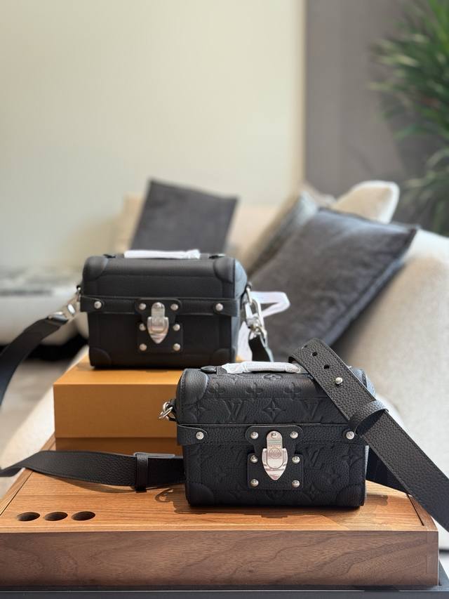 Soul Trunk Handbag M13871 Black Embossed This Soul Trunk handbag is crafted from
