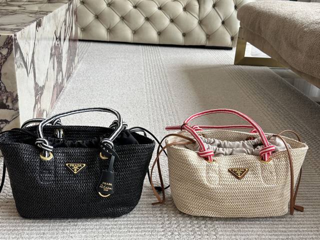 Prada's stunning straw bag is the perfect summer to carry. Summer is almost here