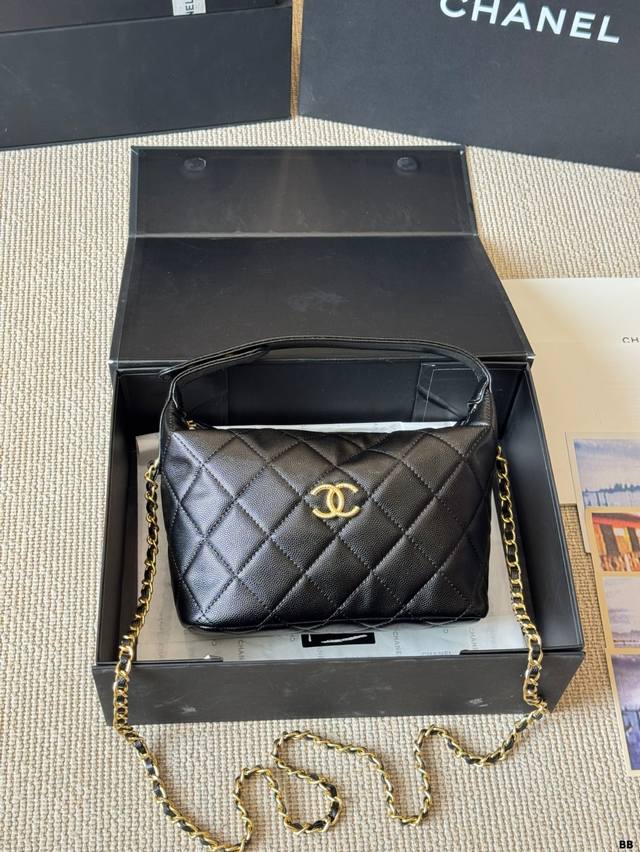 Chanel 25A black embossed lunch box bag is here! It has both a small logo and a