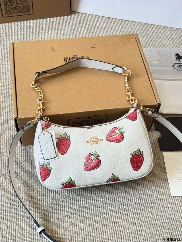 Cowhide version of Coach Strawberry, Coach's hottest underarm bag, is here. This