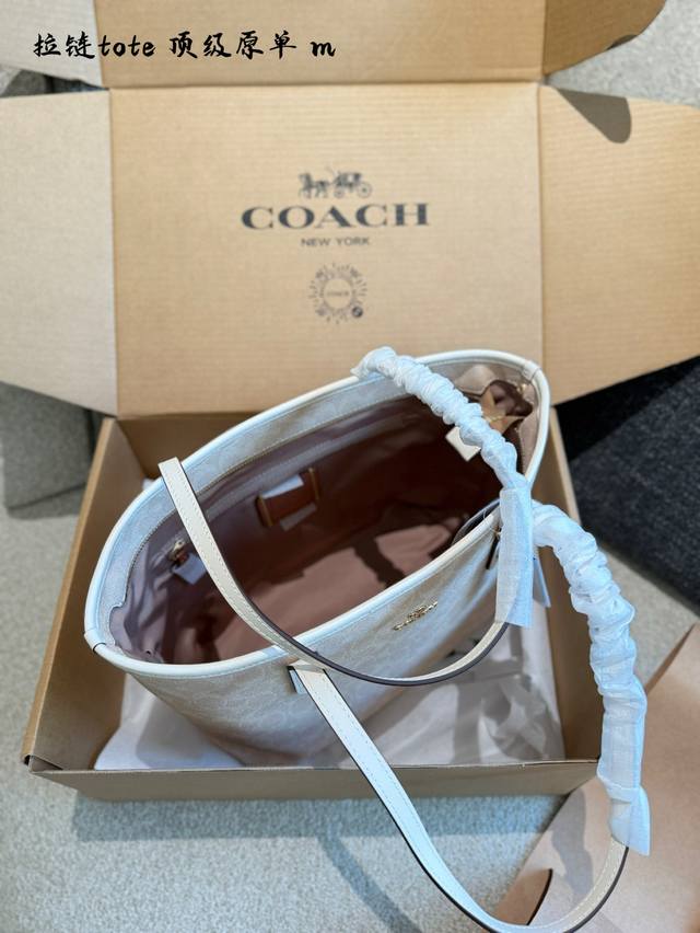 Coach Mollie Open Tote Bag The Coach Mollie Open Tote Bag has two large compartm