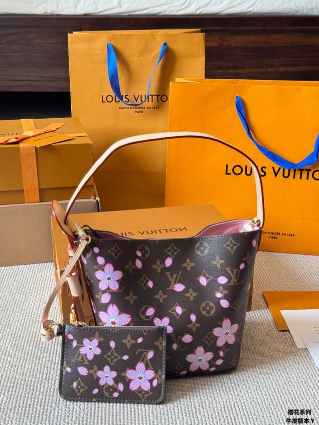leather version of Lv All Inbb handbag features Monogram leather with lustrous h