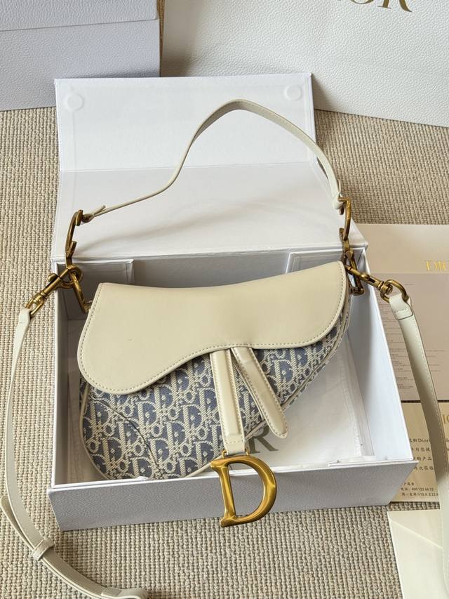 Original Dior Saddle Bag in Raffia Straw. The Raffia Straw collection perfectly