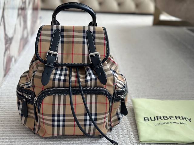 Unboxed) Size: 28 x 32 cm. This backpack is made of waterproof nylon and leather