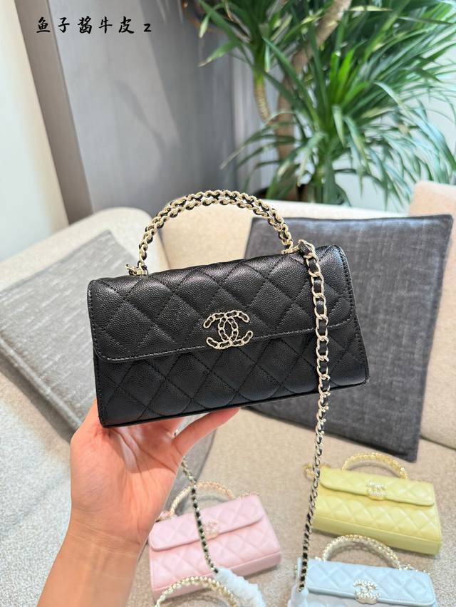 Chanel 25S Cross-Handle Kelly Bag. This season's must-have Kelly bag features a