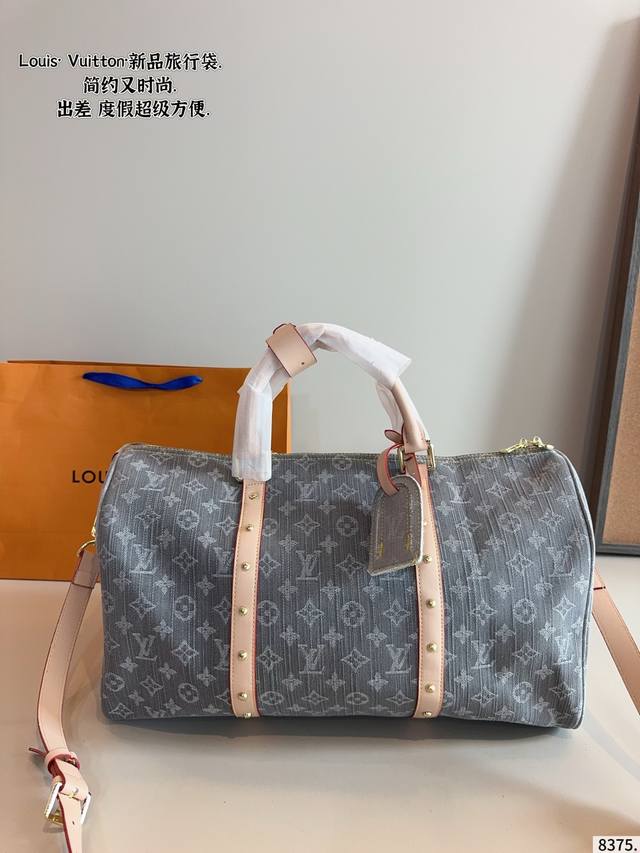 Lv Louis Vuitton's new spring/summer limited edition Keepall travel bag. A styli