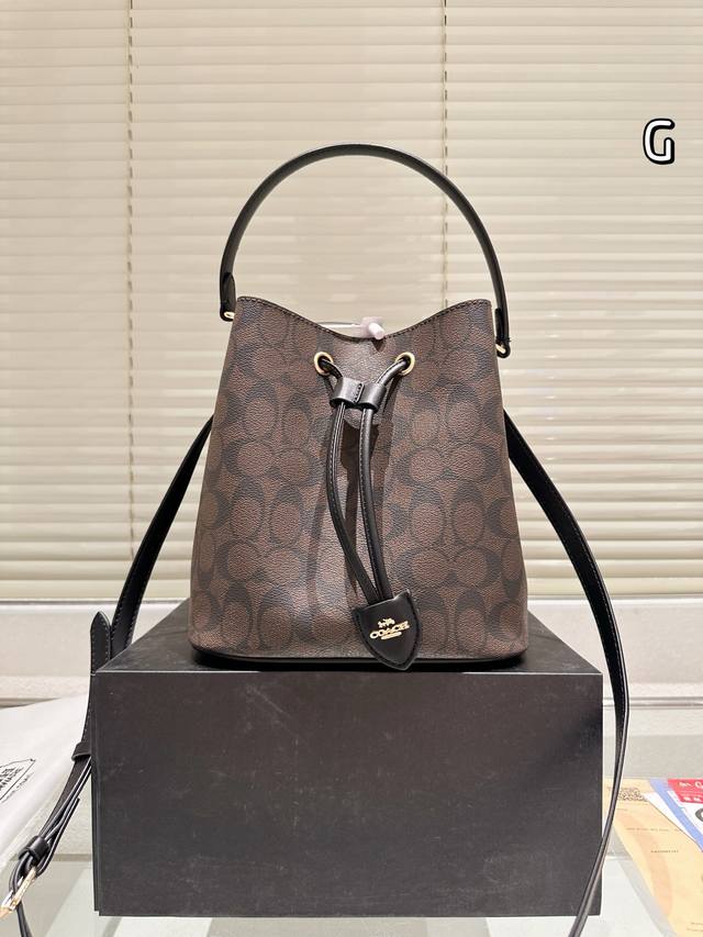 cowhide version of Coach Rowan Bucket Bag is an excellent all-around shoulder ba