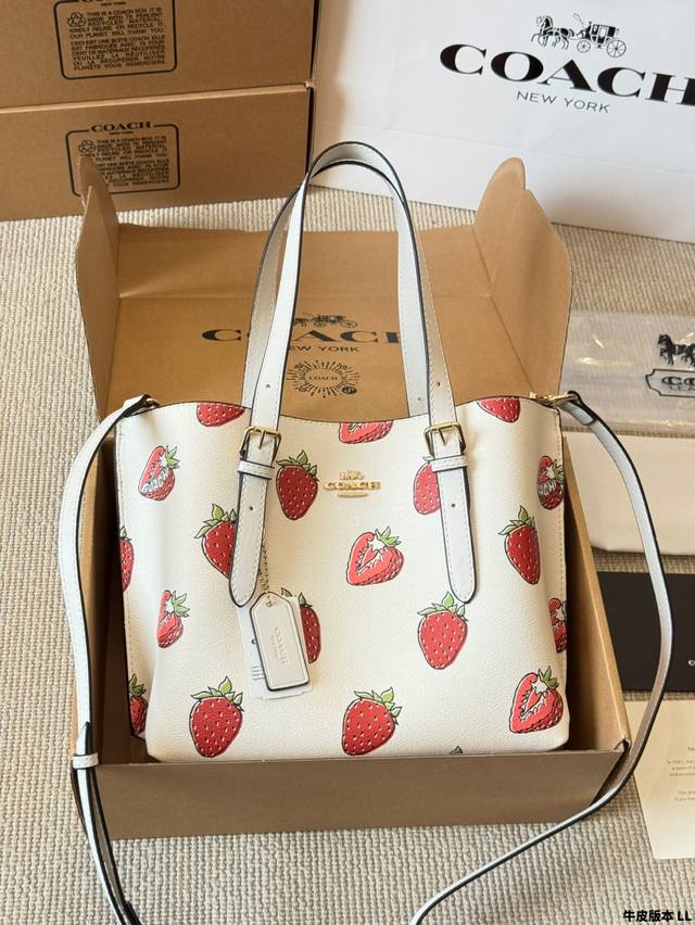 leather version of the Coach Strawberry Mollie 25 tote bag. Coach's latest shopp