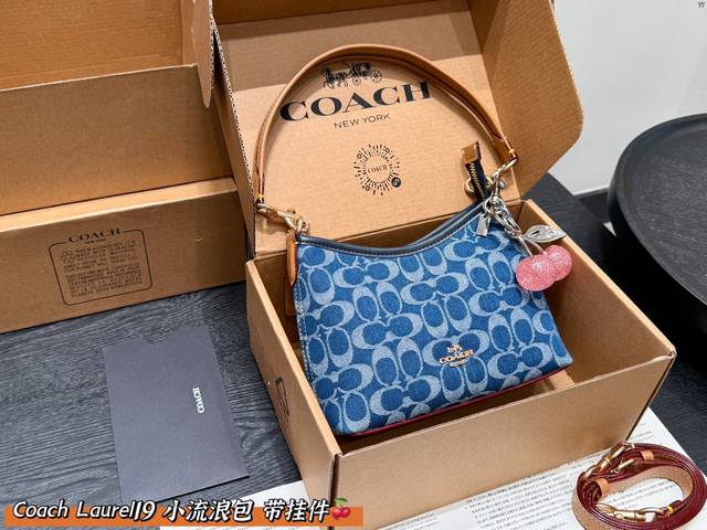 with gift box and cherry pendant! Coach's new Laurel 19 small hobo bag is now av