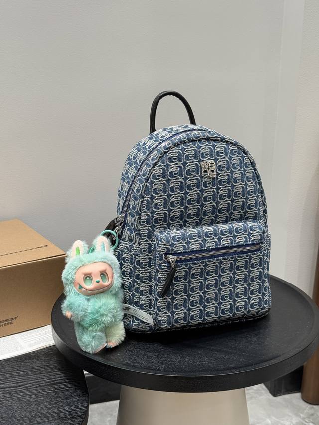 Alexander Wang denim backpack with a pull-on bag pendant. Unisex style. Large ca