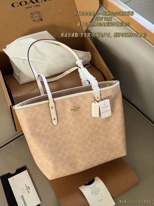Zippered replica with box Size: bottom width 30cm, top width 40cm, height 35cm.