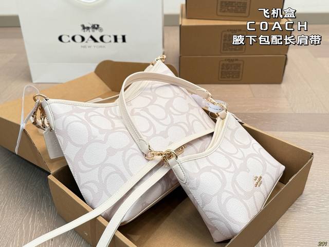 Coach airplane box bag with long shoulder strap. Can be worn on one shoulder or