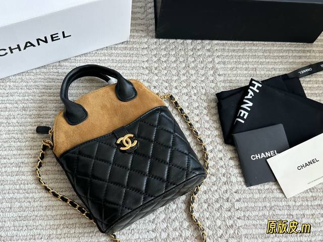 This small lambskin shell is no small bag. The leather texture of the Chanel 25A