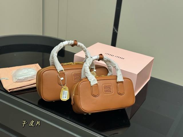 with box Size: 28*13cm 23*11cm The Miumiu bowling briefcase is just the right am