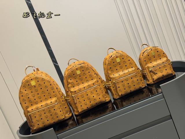 Mcm classic backpack with airplane box. Three-dimensional and natural floral pat