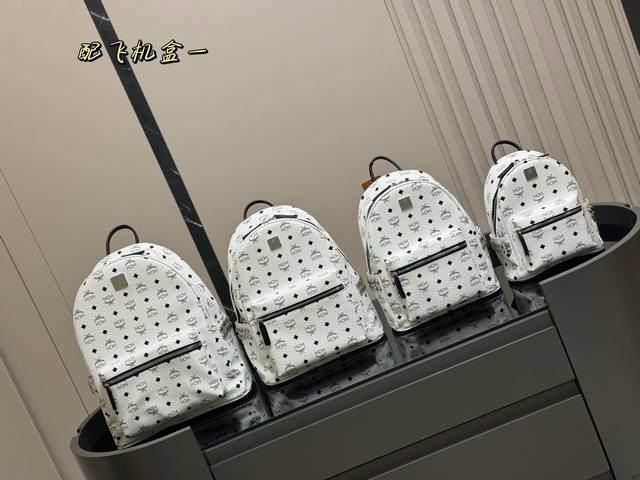 Mcm classic backpack with airplane box. Three-dimensional and natural floral pat