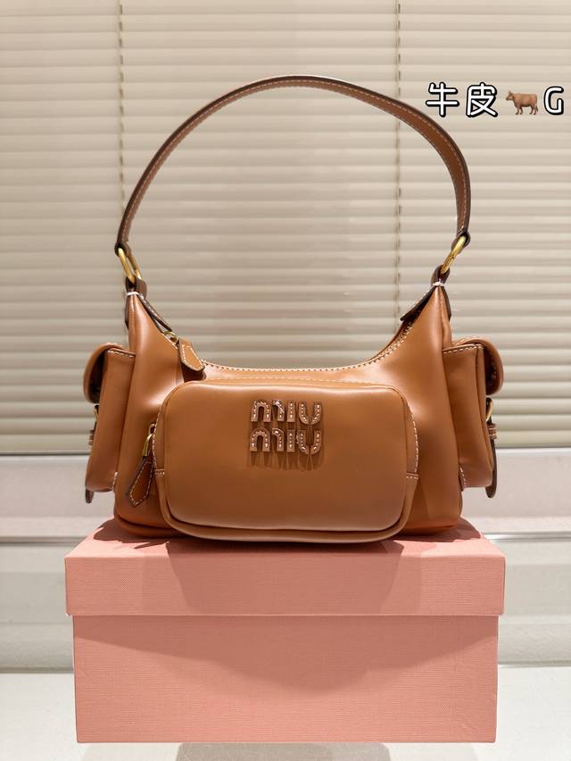 Premium Original Cowhide Leather Miu Miu Mini Motorcycle Bag. The new Softy Padd