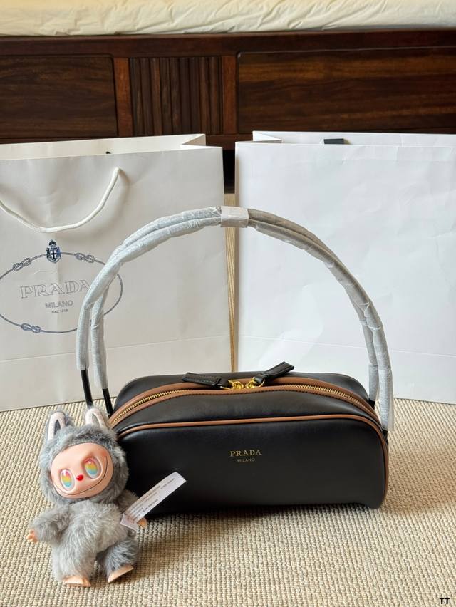 Prada's new colorblock bowling underarm bag cleverly combines classic and modern