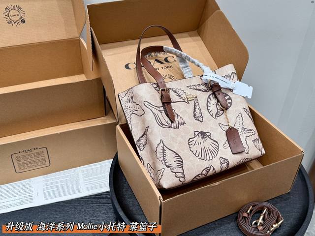 Ocean Series Shell Print Size: 25*22cm Coach's new Mollie 25 Tote is really a fa