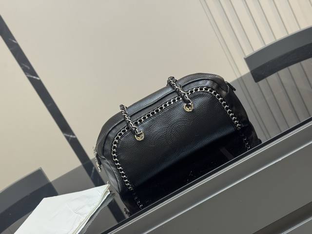 recommends a Chanel bowling handbag that is stylish and elegant. Chanel is worth
