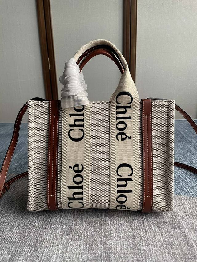 Chloe's small Woody tote with shoulder strap has been a huge hit this year. Man