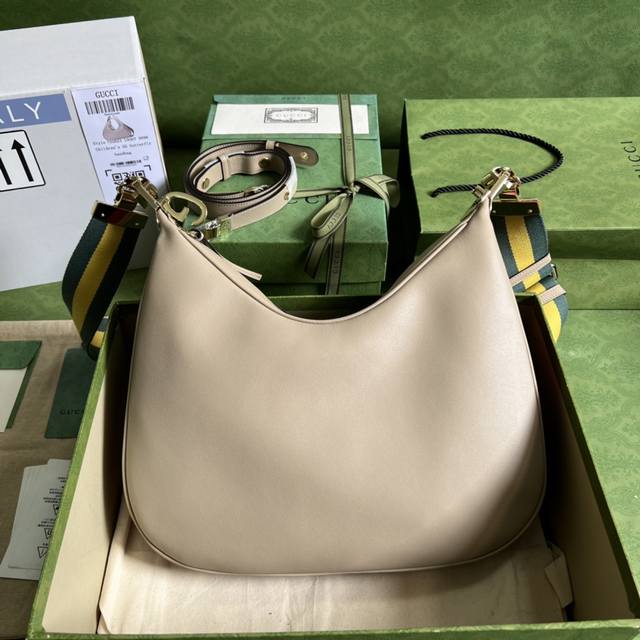 Gggucci Attache Large Shoulder Bag. Gucci's March of Love collection reinterpret