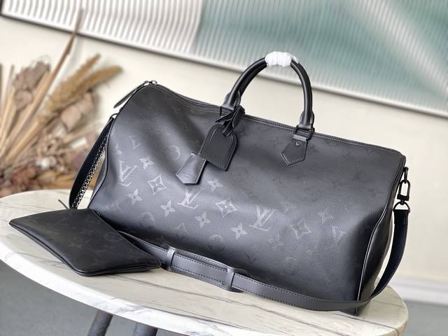 The M14022 Speedy P10 Bandouliere 50, a spacious and luxurious handbag crafted