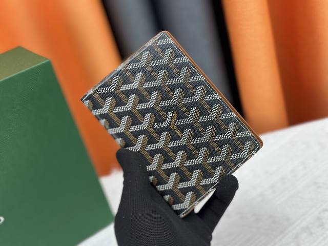 Original, original, and photographed in-house, the M64502 passport holder is th