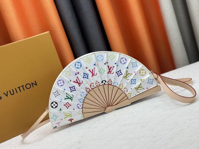 This updated version of the original M14804 Lv Fan bag is crafted from Monogram