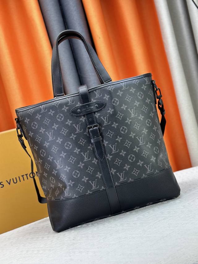 This Saumur tote is inspired by Louis Vuitton's iconic Saumur handbag, first in