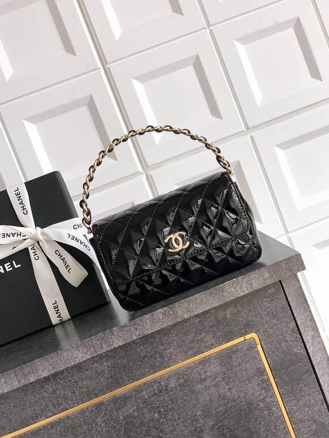 This is a top-tier, original black patent leather Ohanel 25P hidden evening bag