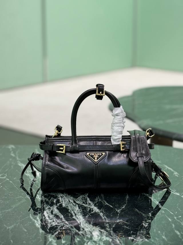 Softlux Waxed Leather This mini crossbody bag is made of imported waxed leather,