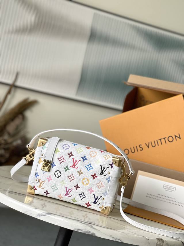 Top-grain leather, original M14046. This Side Trunk medium bag, featuring a play