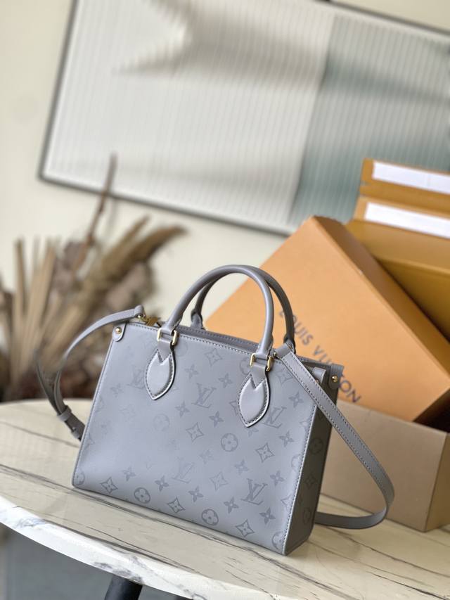 The Monogram Ink series Onthego small handbag, a top-grain leather authentic M1