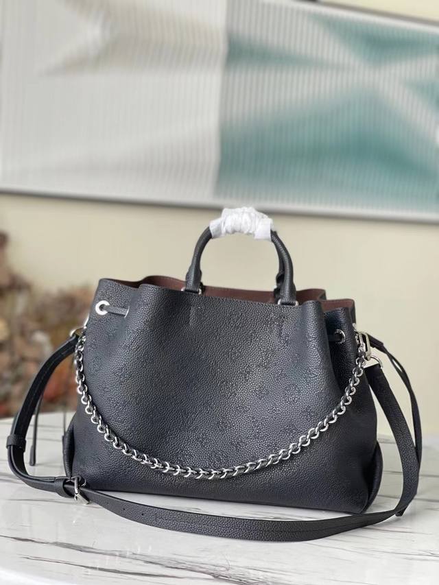 Original, top-grain leather, M59200. The black Bella Tote is crafted from soft,
