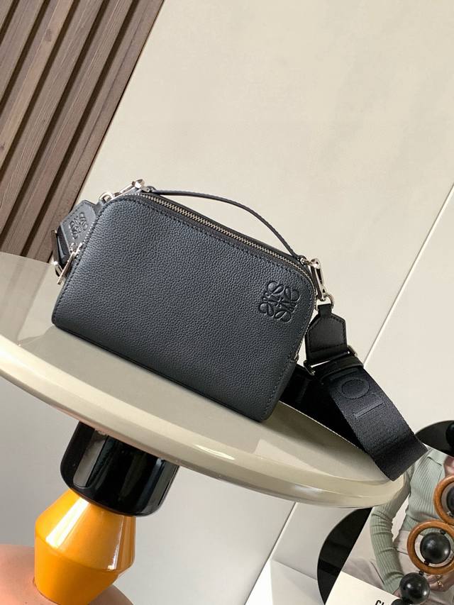The satin cowhide leather mini camera crossbody bag meets your multi-functional