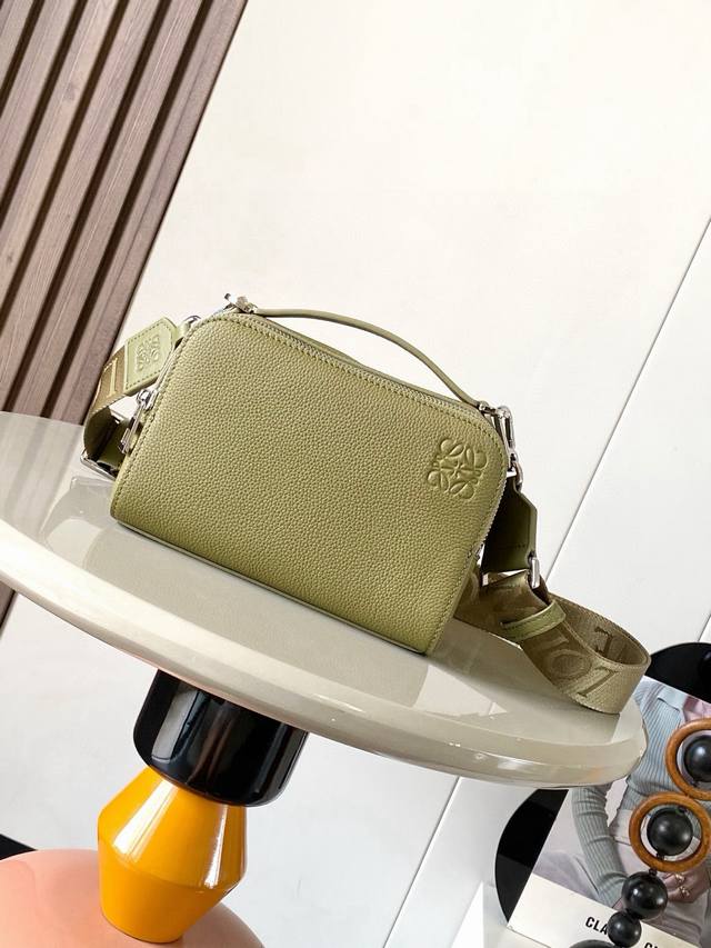 The satin cowhide leather mini camera crossbody bag meets your multi-functional