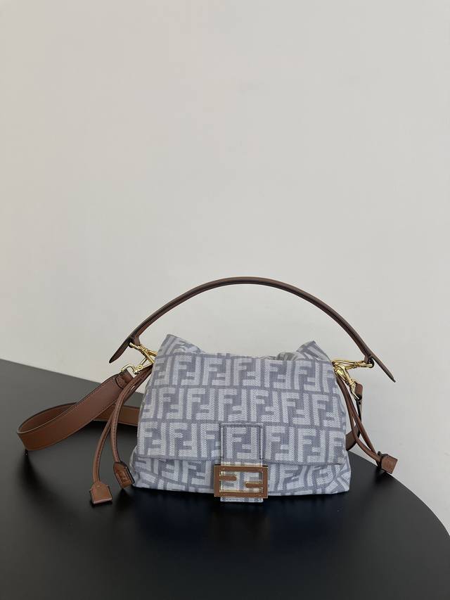 Fendi Denim Mama Baguette Bag! The double F embroidery combines vintage denim el