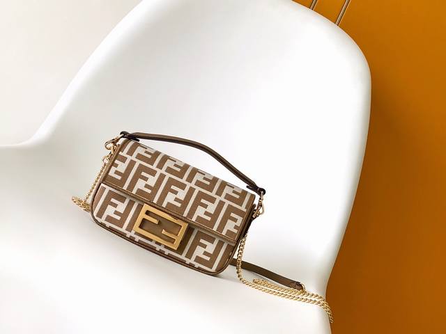 Small Baguette handbag, made of jacquard fabric, decorated with the iconic Ff p