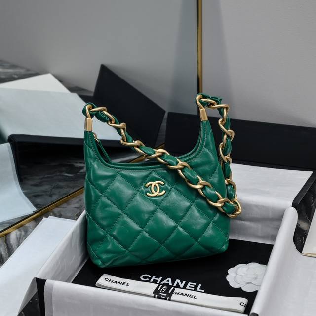 The top-of-the-line, original Chanel*24A Hobo in a small size just keeps getting