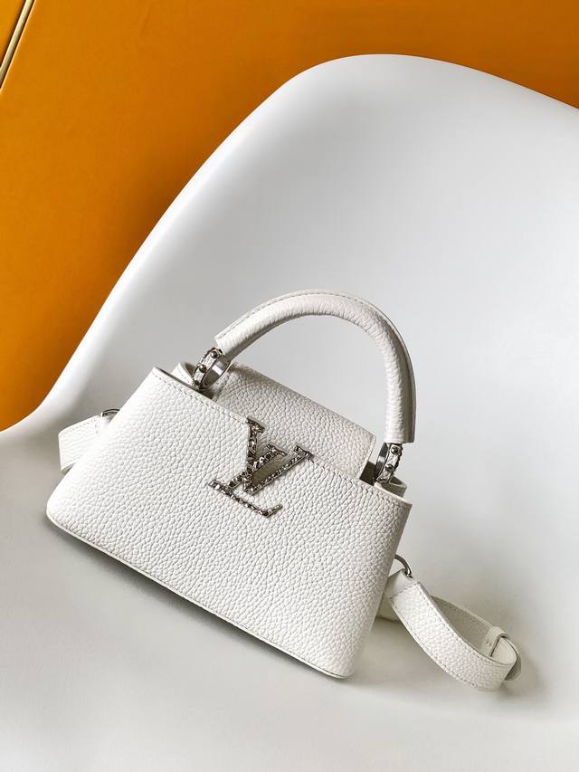 M24666 Nude Pink, M24671 White, M24664 Black. This Capucines East West mini bag