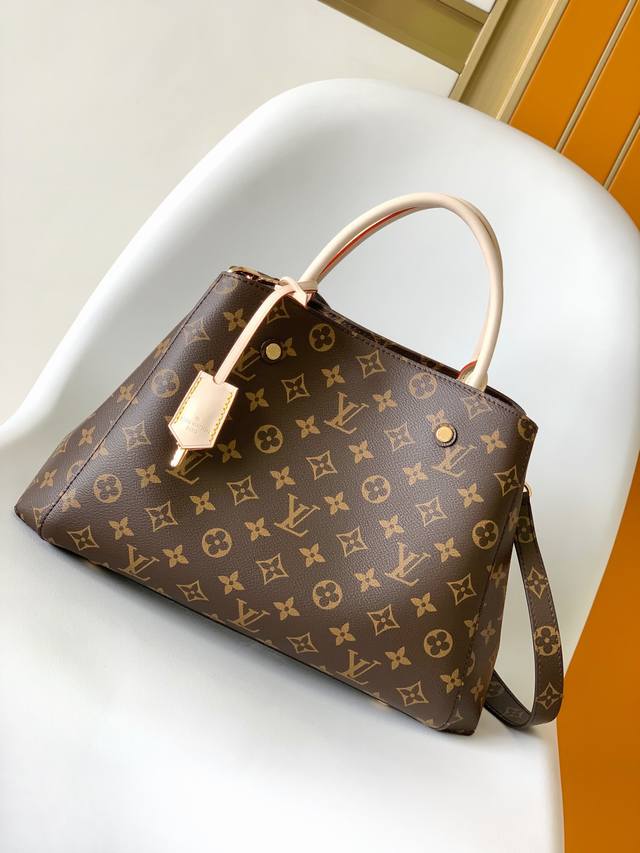 M41056 This premium, original Montaigne medium handbag, named after an elegant P