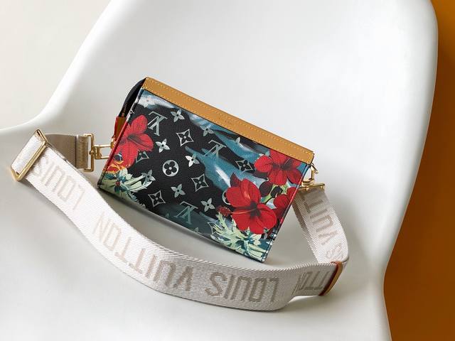 The new Graffiti Alpha Wearable Wallet, featuring Monogram Eclipse canvas and l