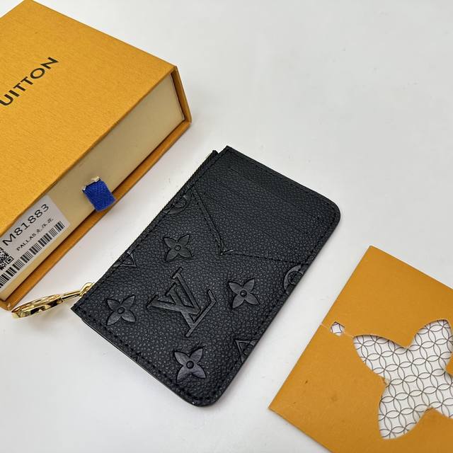Premium original M81883 This Romy business card holder is crafted from Monogram