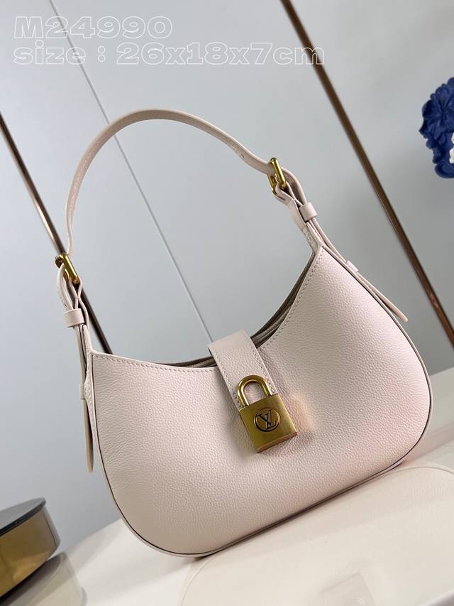 Top-quality original M24990 Low Key Shoulder Bag, this white model, showcases t
