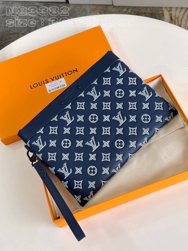 Original N83382 Pochette To-Go clutch. Made from exquisite Monogram Shadow embo