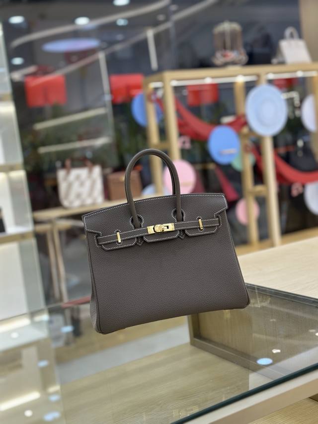 Birkin 25cm Togo leather, fully hand-sewn with waxed thread. Elephant gray gold