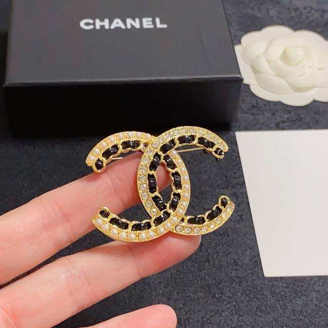 Chanel's newest products are now available at the Chanel boutique. The pearl-wov