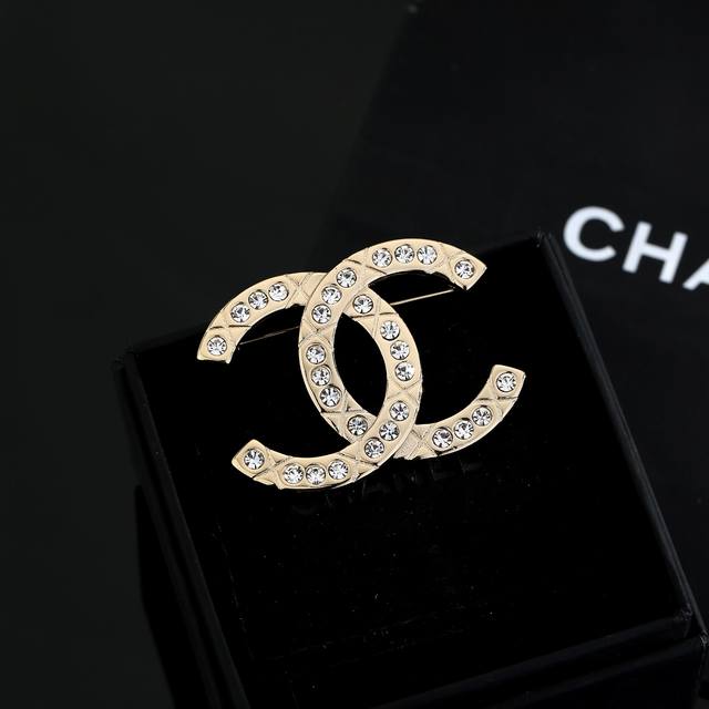 Chanel's latest crystal brooch is incredibly sophisticated and eye-catching. Cr